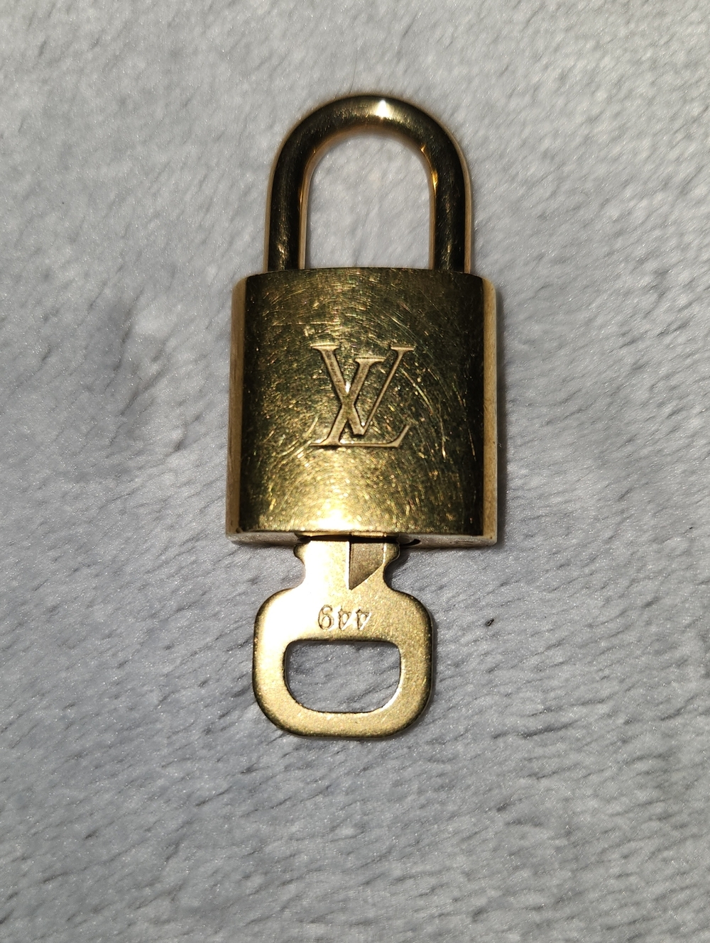 Louis Vuitton Shiny Gold Padlock with LV Monogram 449